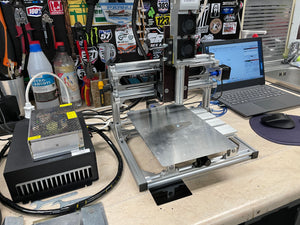 An affordable 4 watt DPSS (infrared) laser metal marking and engraving head - works with all 3D printers and CNC machines