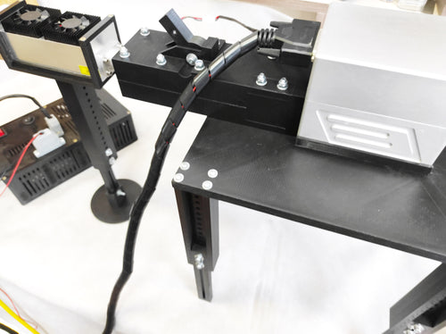An Endurance DIY marking machine with 4 / 10 / 30 / 50 watt DPSS / Fiber (Raycus) laser modules with a Sino Galvo head.