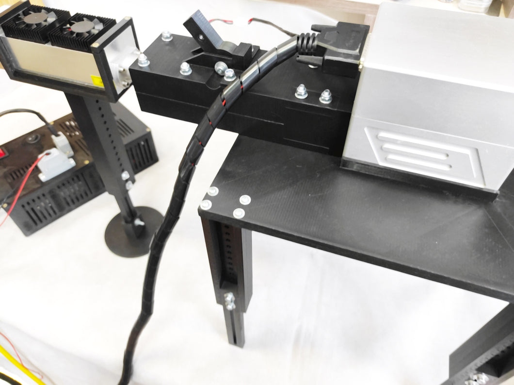An Endurance DIY marking machine with 4 / 10 / 30 / 50 watt DPSS / Fiber (Raycus) laser modules with a Sino Galvo head.