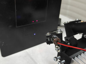 Laser focusing attachment system.