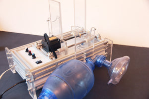 The robotized Ambu breathing system. Portable lungs ventilator